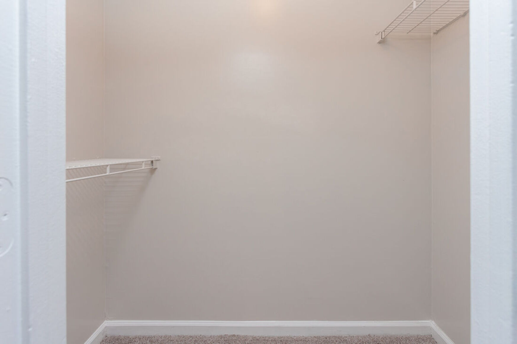 Closet with clothing racks