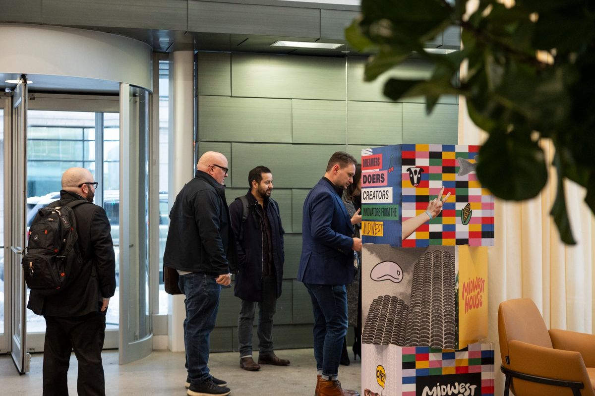 People networking at Midwest House event