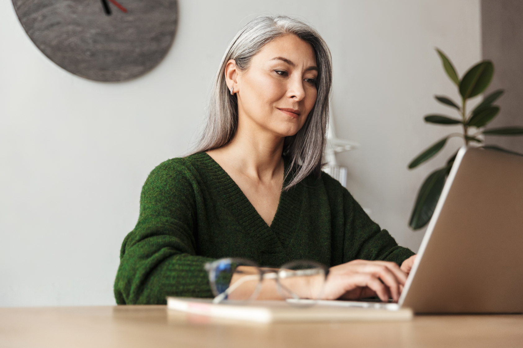 Woman on computer stock image