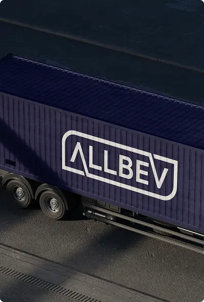 A dark blue shipping container on a truck trailer displays the white ALLBEV logo on its side, photographed from above.