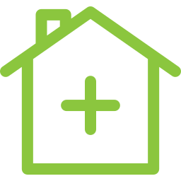 A green house with a plus sign on it.