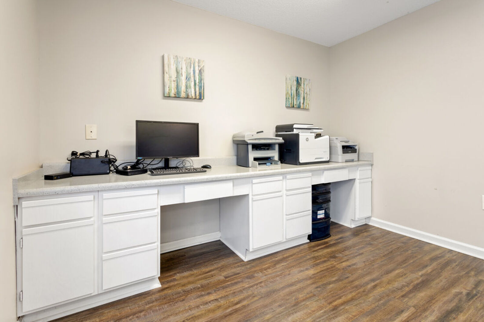 Business center with desk and computers