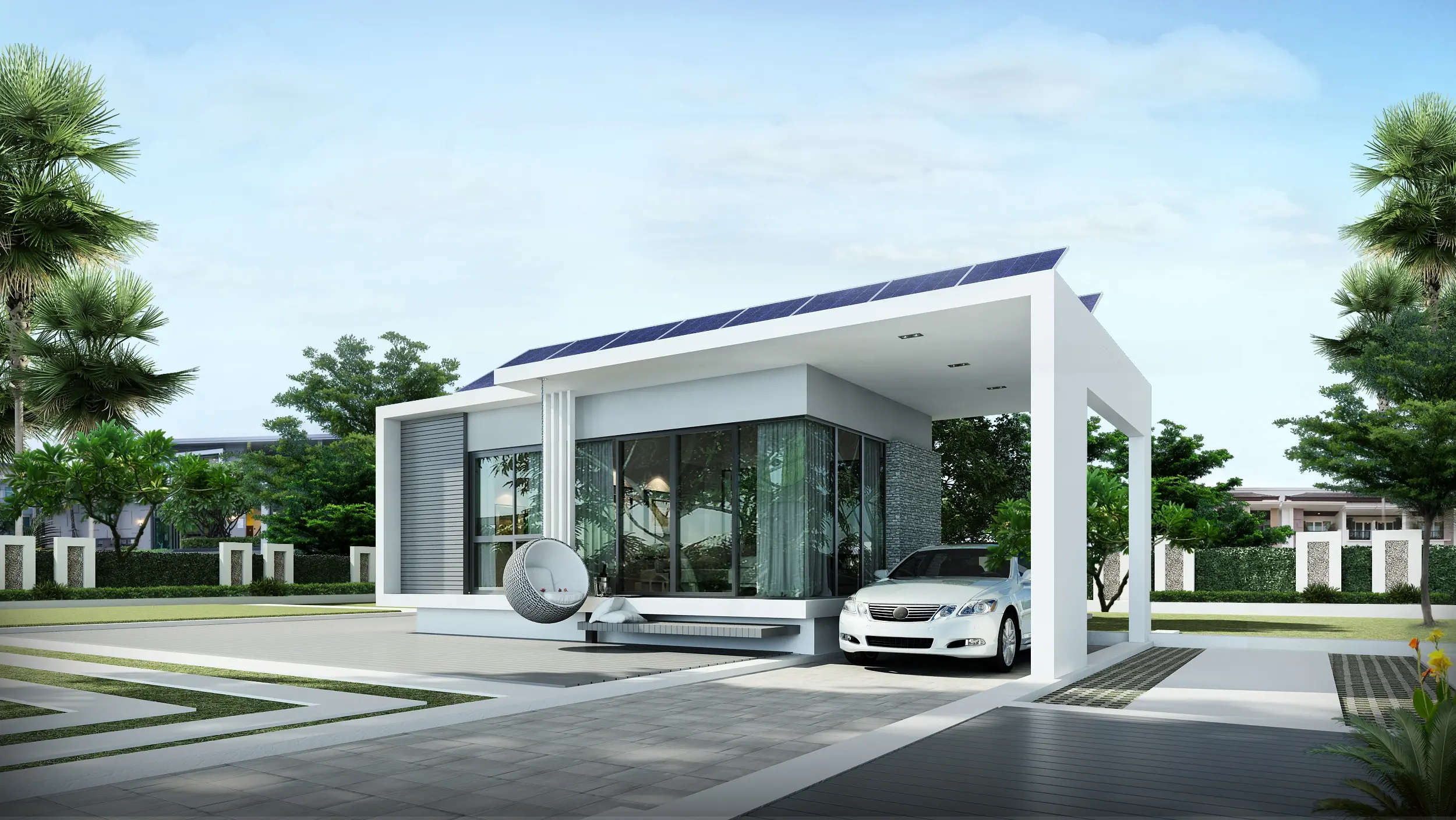 Modern single-story house with large glass windows, solar panels on flat roof, a hanging chair on the porch, and a car parked under a white carport.
