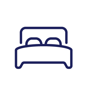 Icon of a bed with two pillows, representing a double bed.