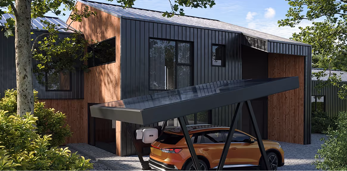 Modern house with black and wood exterior and a car under a solar panel carport.