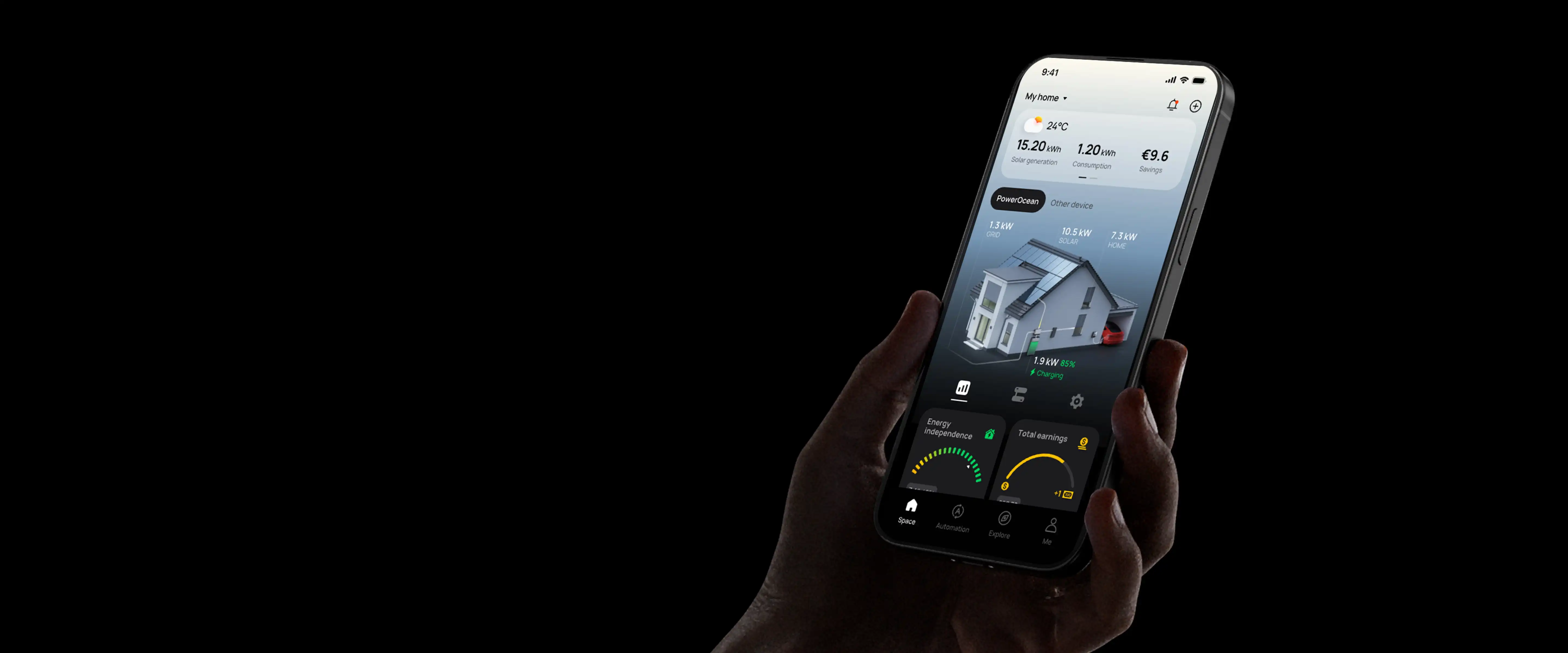 Hand holding phone showing home energy app with solar generation, consumption, savings, and charging status.