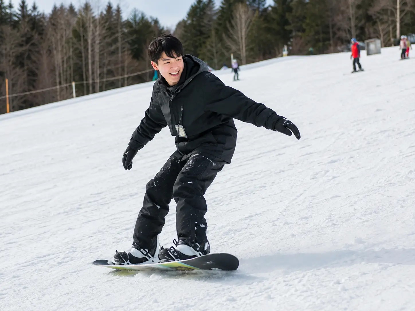 young man skiing on the snow