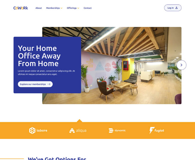 Modern coworking space with wooden ceiling beams, lounges with chairs and tables, and indoor plants.