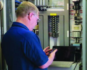 Systems engineer installing network