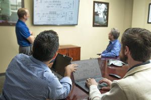 Engineers and clients during design-build strategy meeting