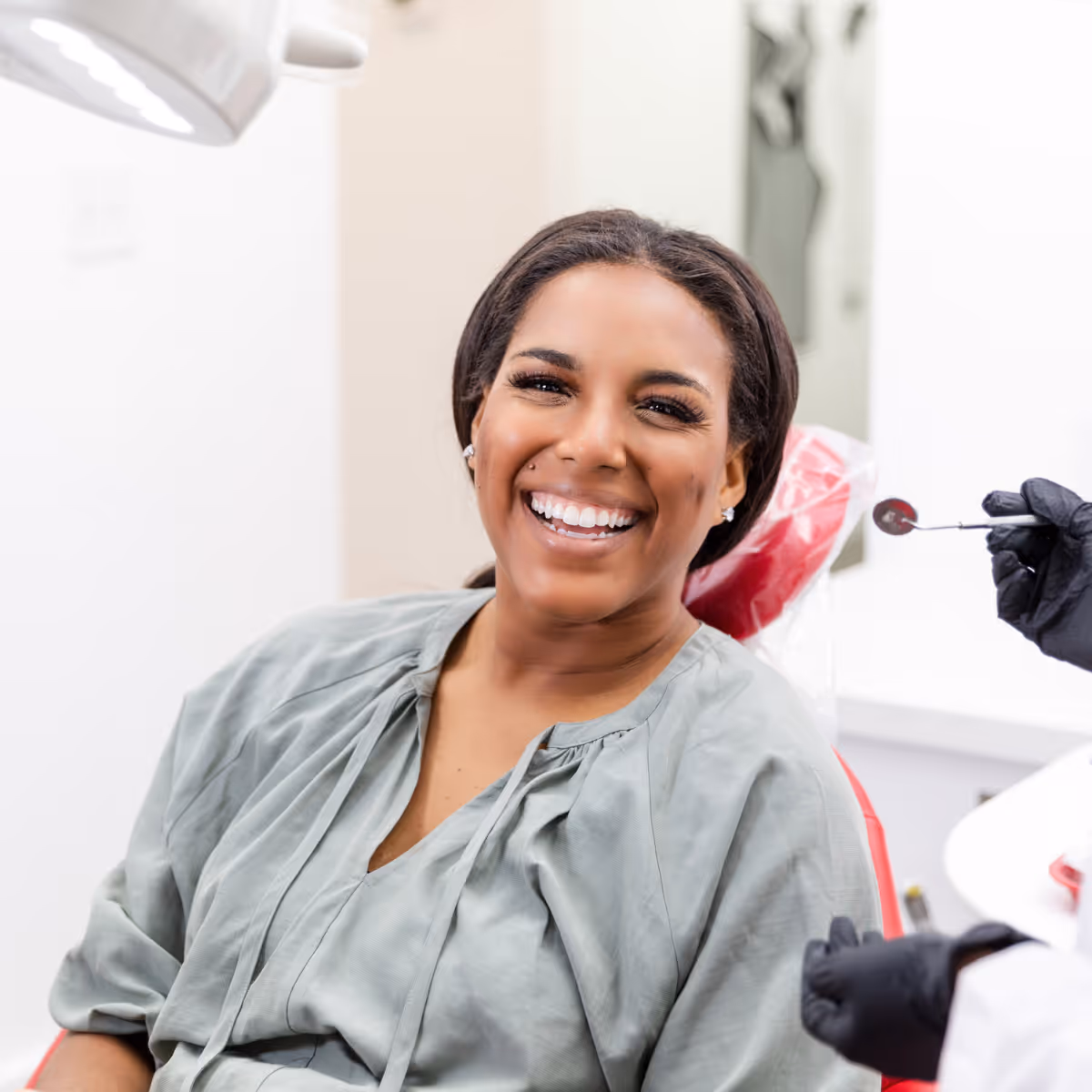 Happy patient at dental practice