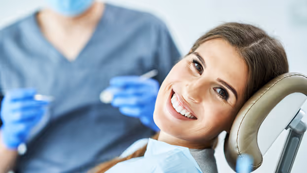 Dental patient smiling and looking at camera