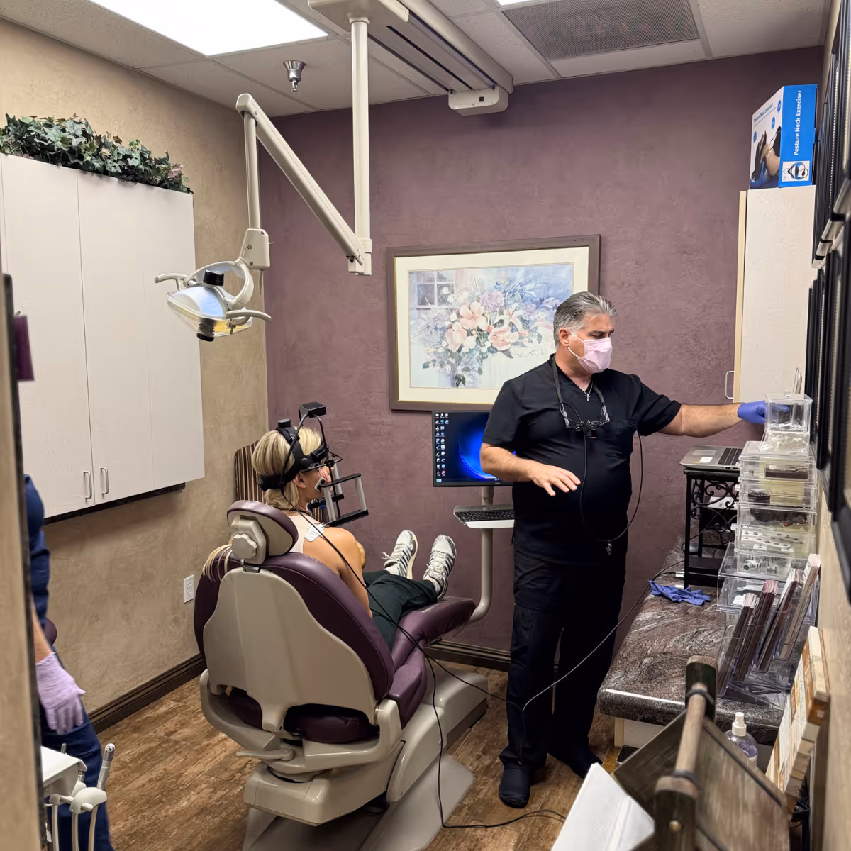 Gilbert dentist Dr. John Garza using advanced neuromuscular diagnostics.