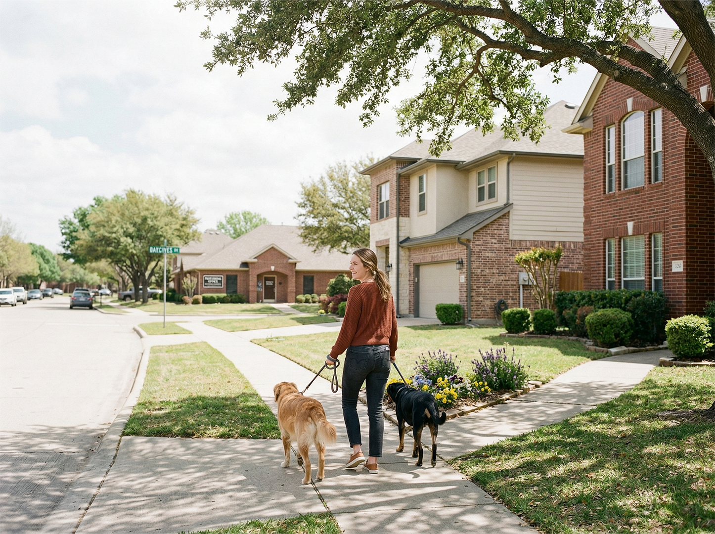 Suburban street with established homes and nearby commercial areas in North Richland Hills, Texas