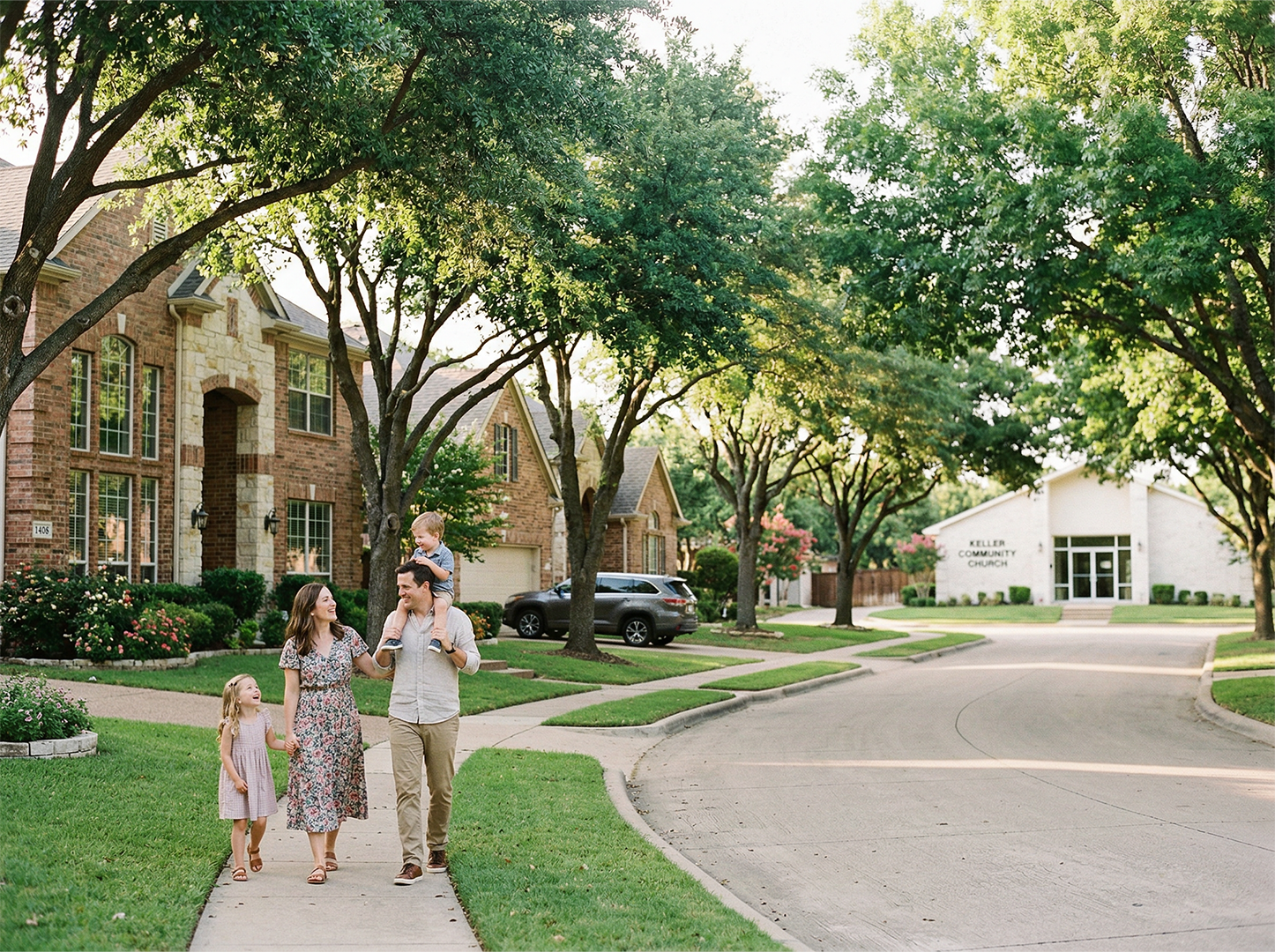 Family neighborhood with brick homes and large windows in Keller, Texas