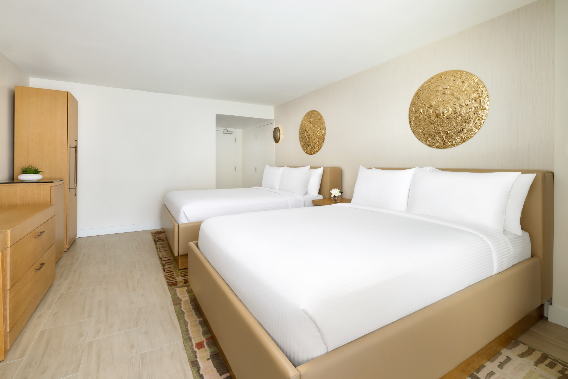 This laid-back 360-square-foot retreat featuring two comfortable queen beds and a private terrace. Revel in the iconic energy of the city.