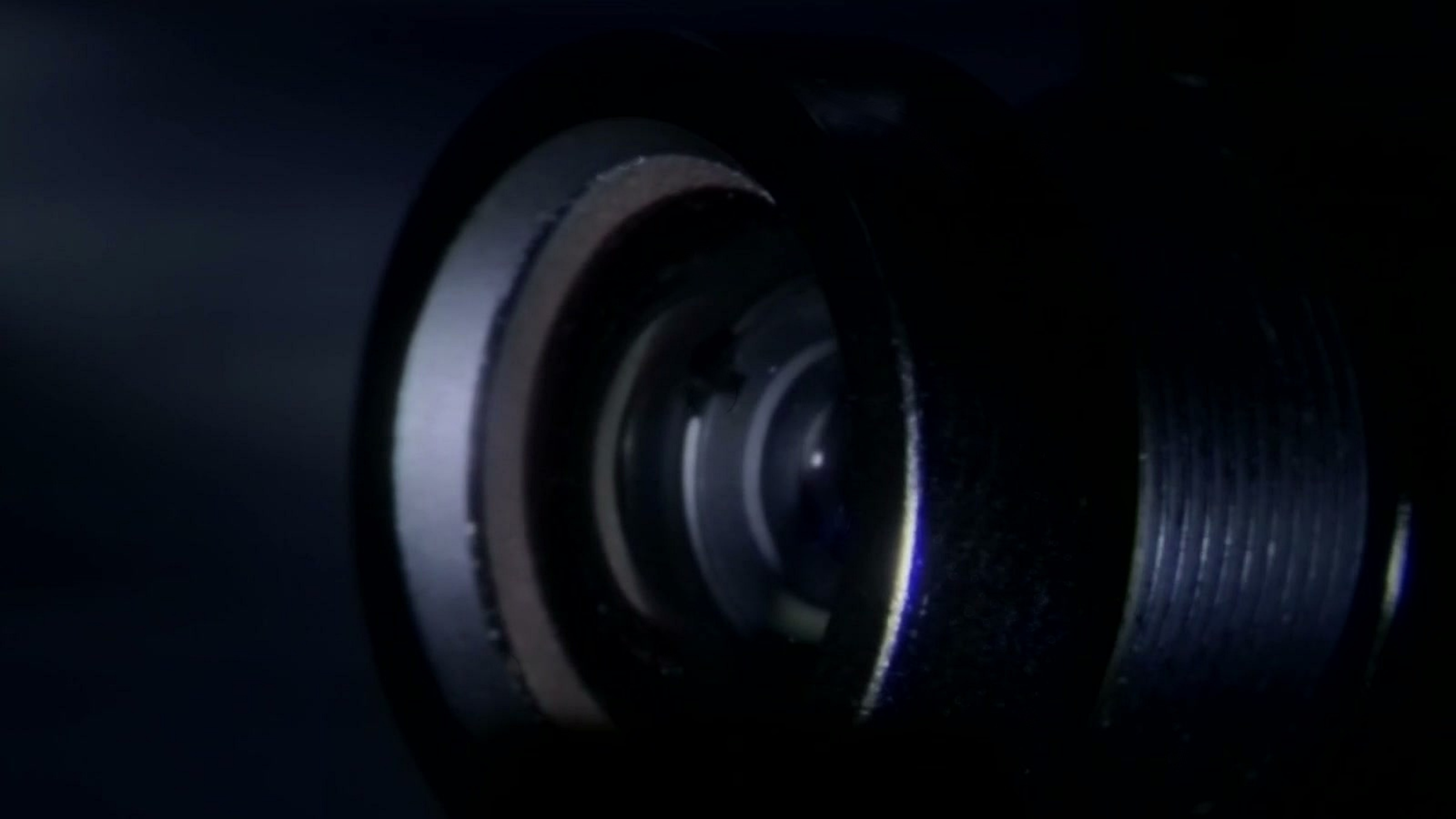 Close-up of the optic with light across its front element.