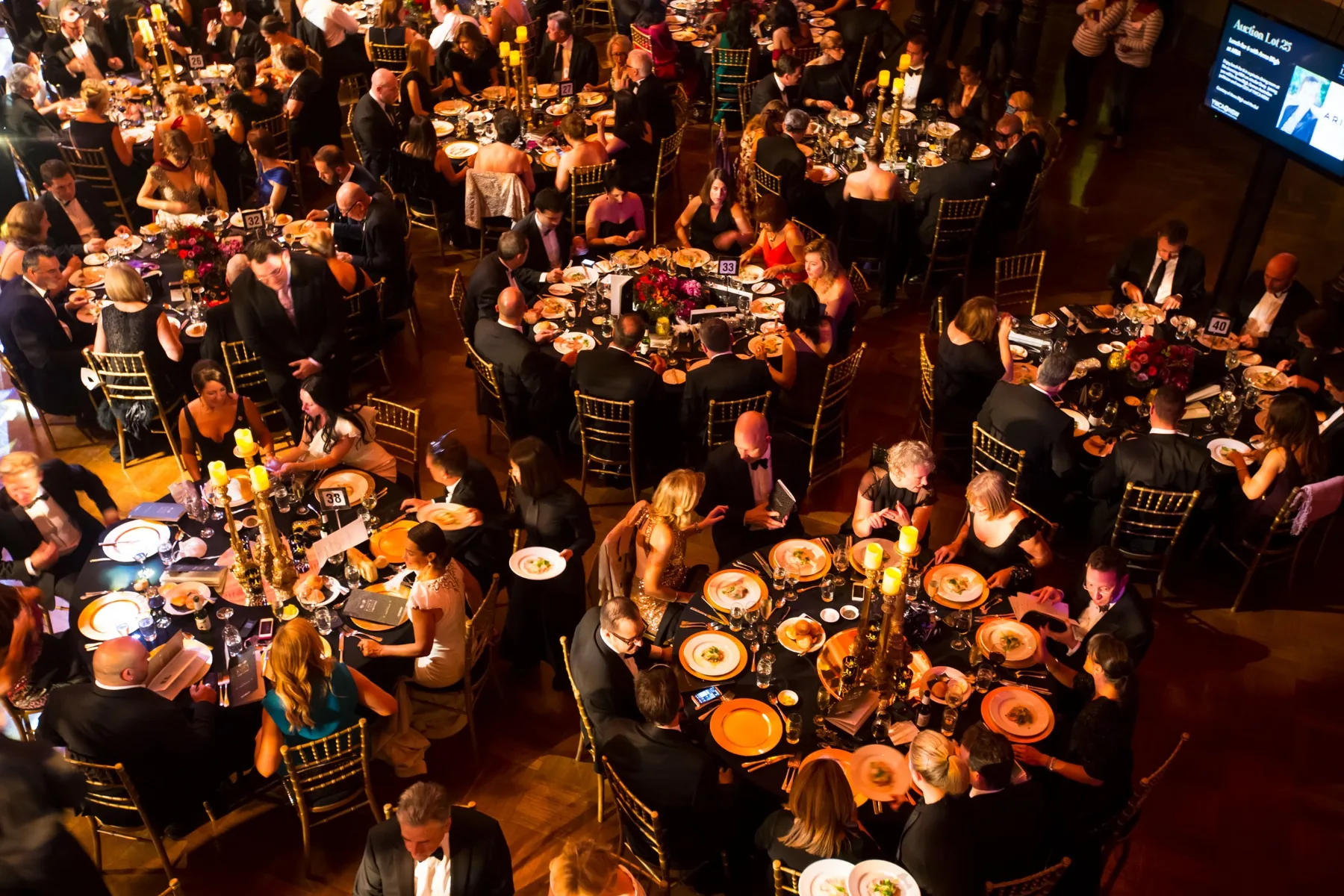Guests at a charity gala dinner fundraising event