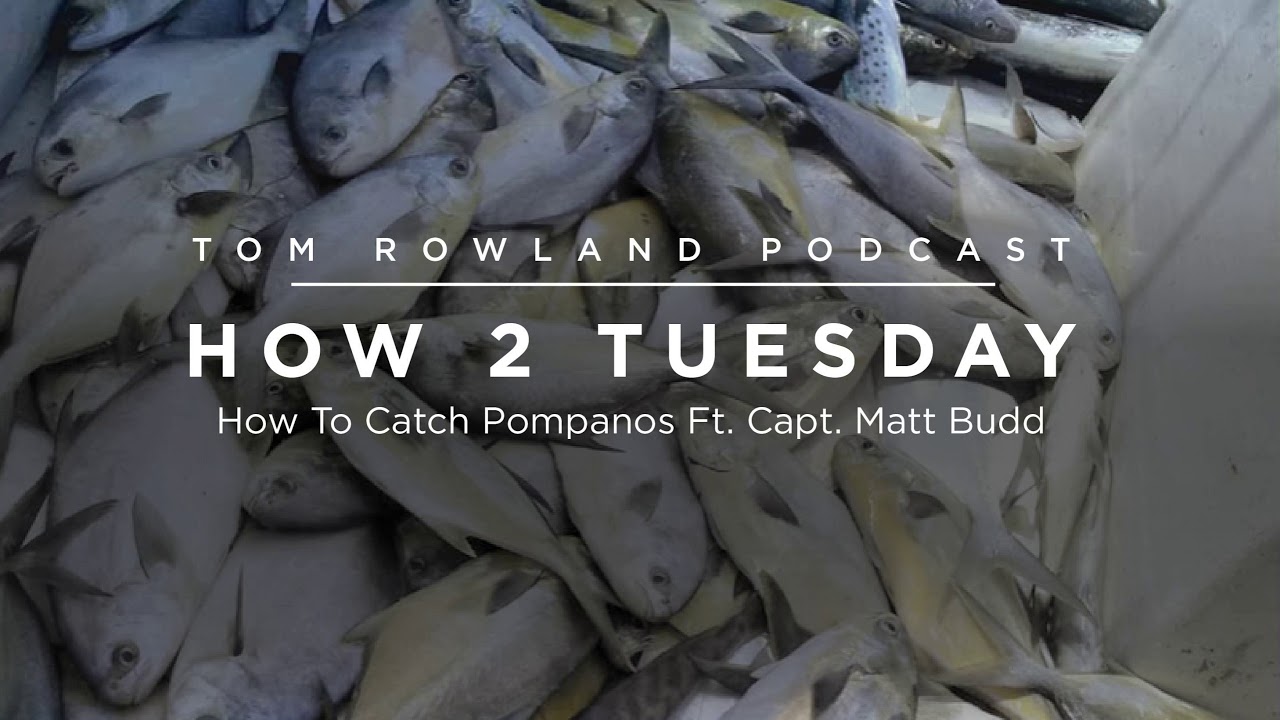 Capt. Matt Budd holding a pompano caught on a goofy jig