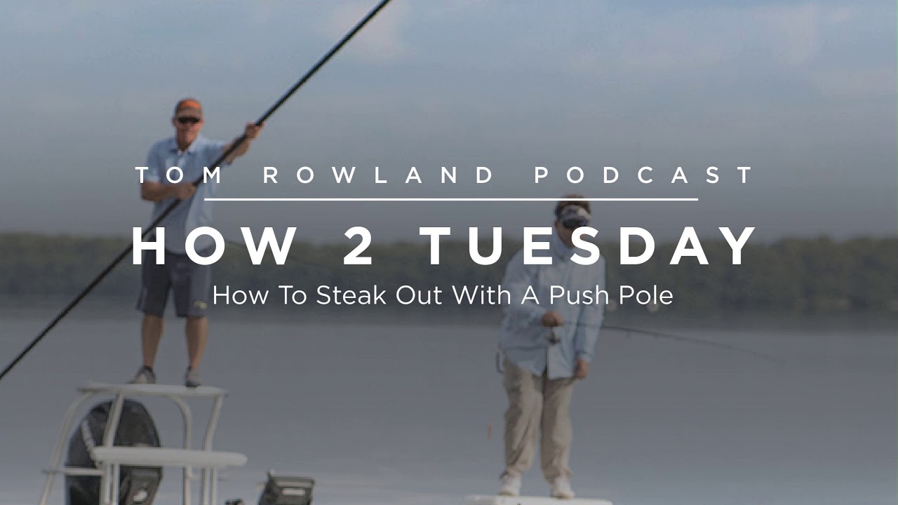 Push pole staked out at a low angle holding a flats skiff
