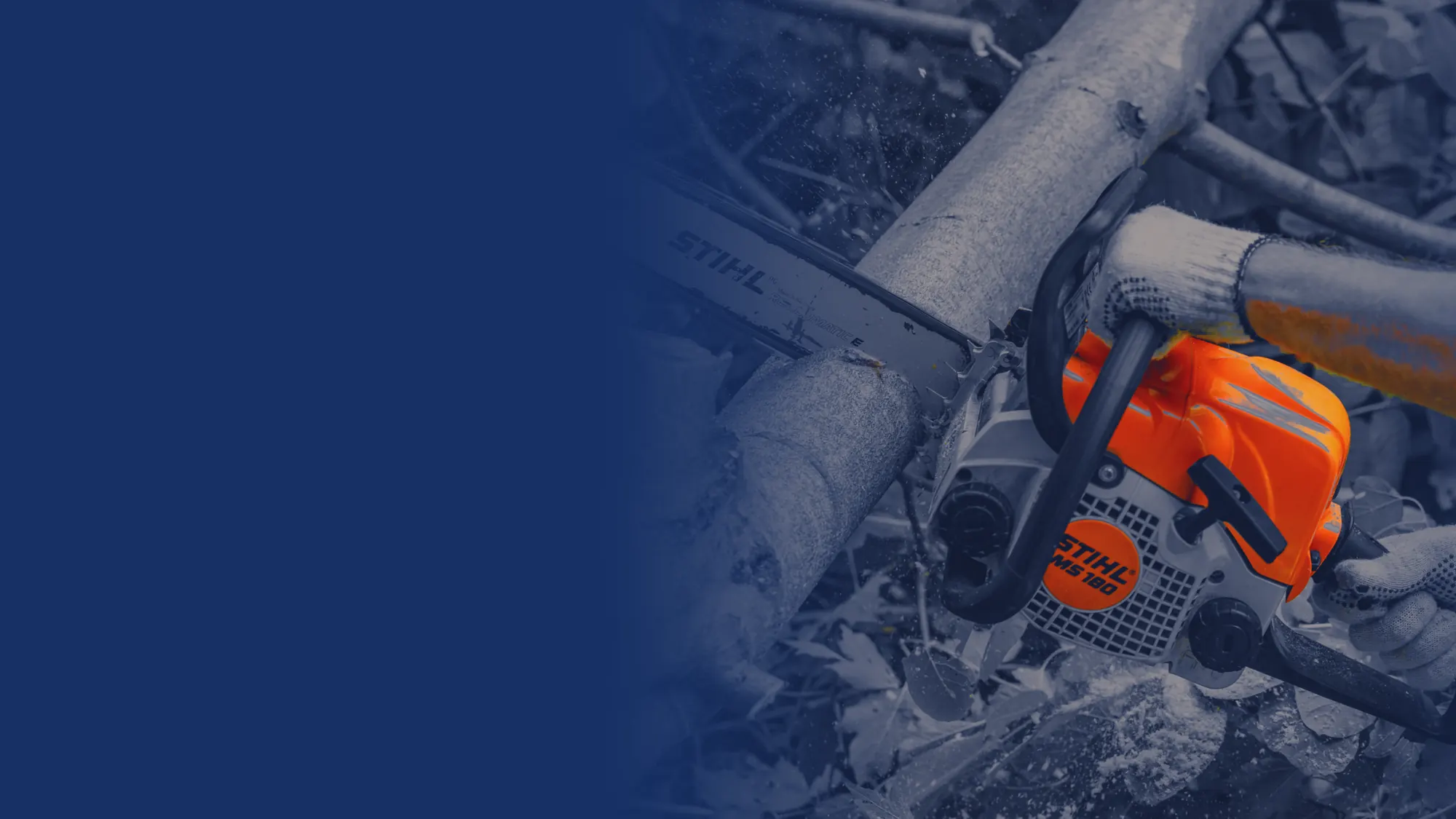 STIHL chainsaw cutting through a tree limb