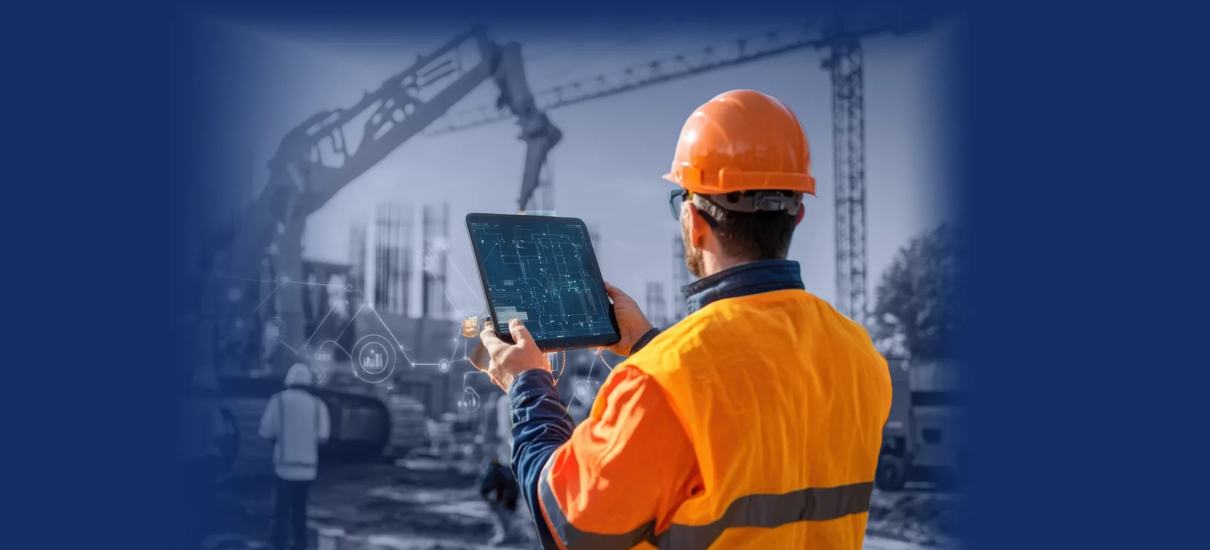 Site manager in a hard hat checking a tablet beside an excavator on a construction job site