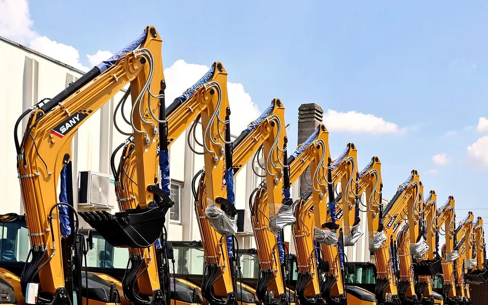 Row of new SANY excavators on a dealer lot