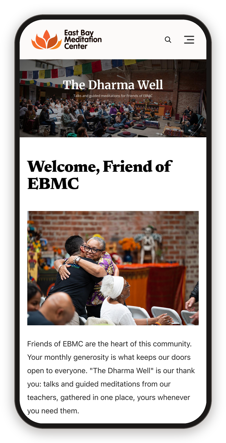 The Dharma Well shown on a phone, with the banner photo of the meditation hall and a welcome message for Friends of EBMC