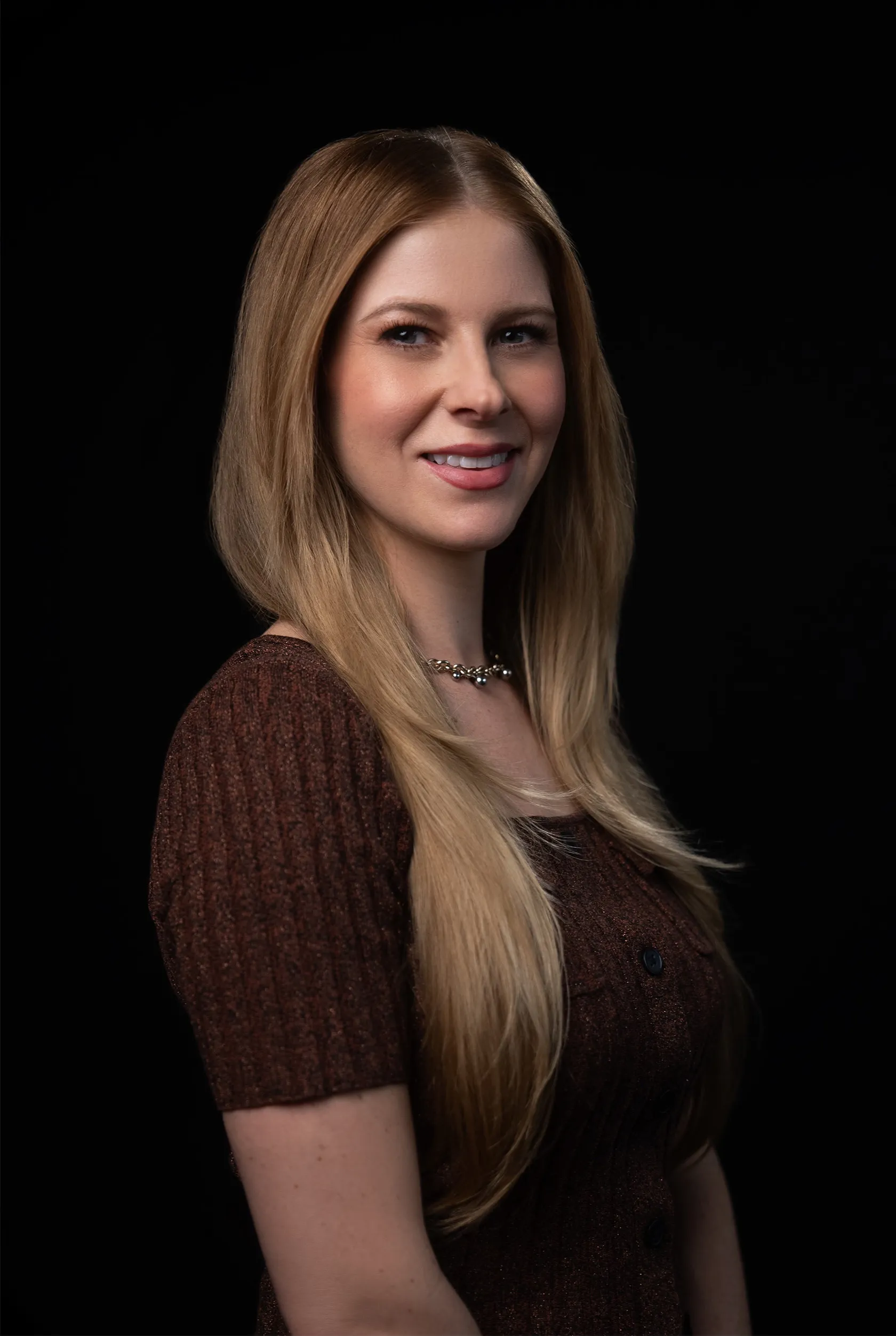 a professional headshot of megan parent