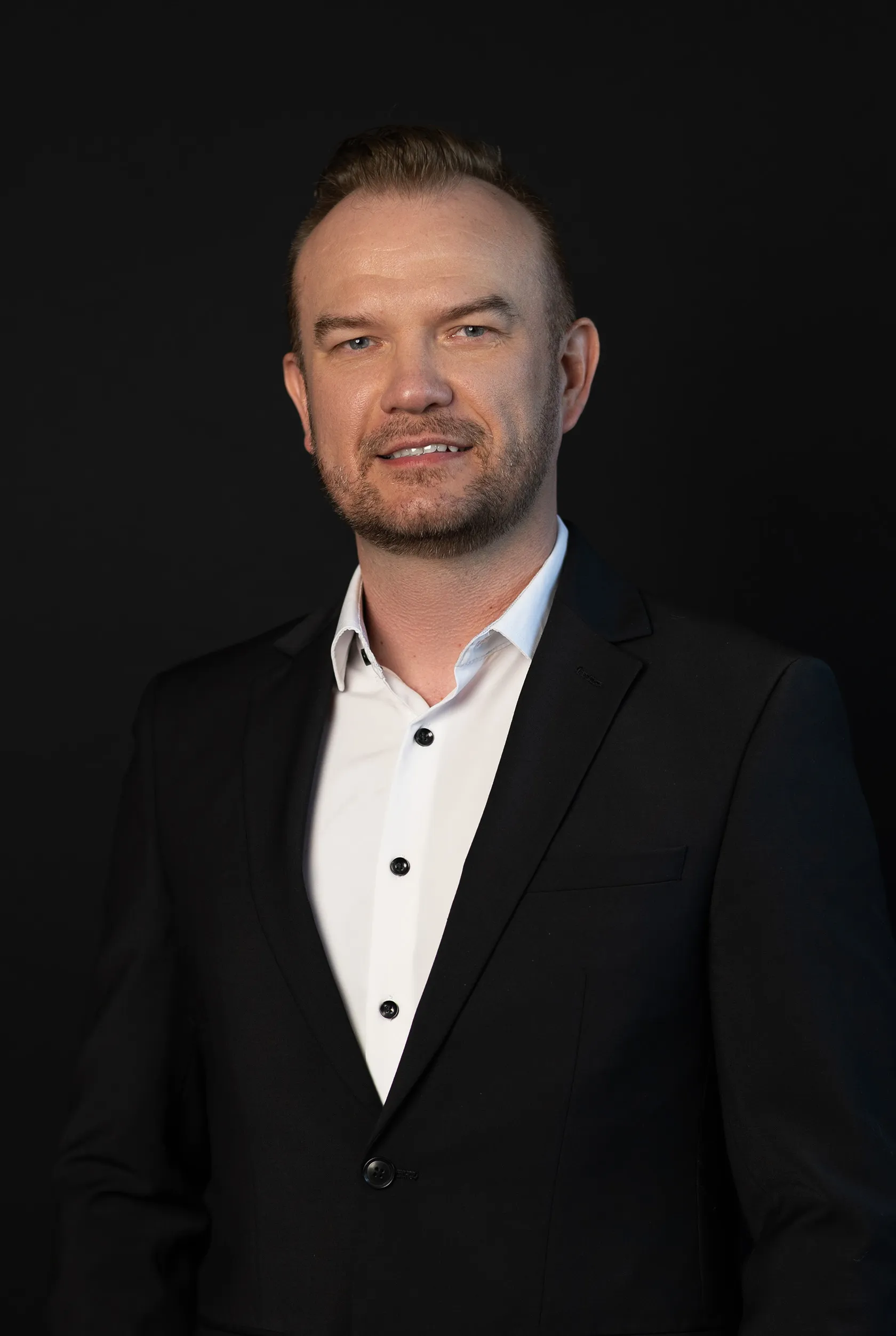 a headshot of Roman Kasyanyuk