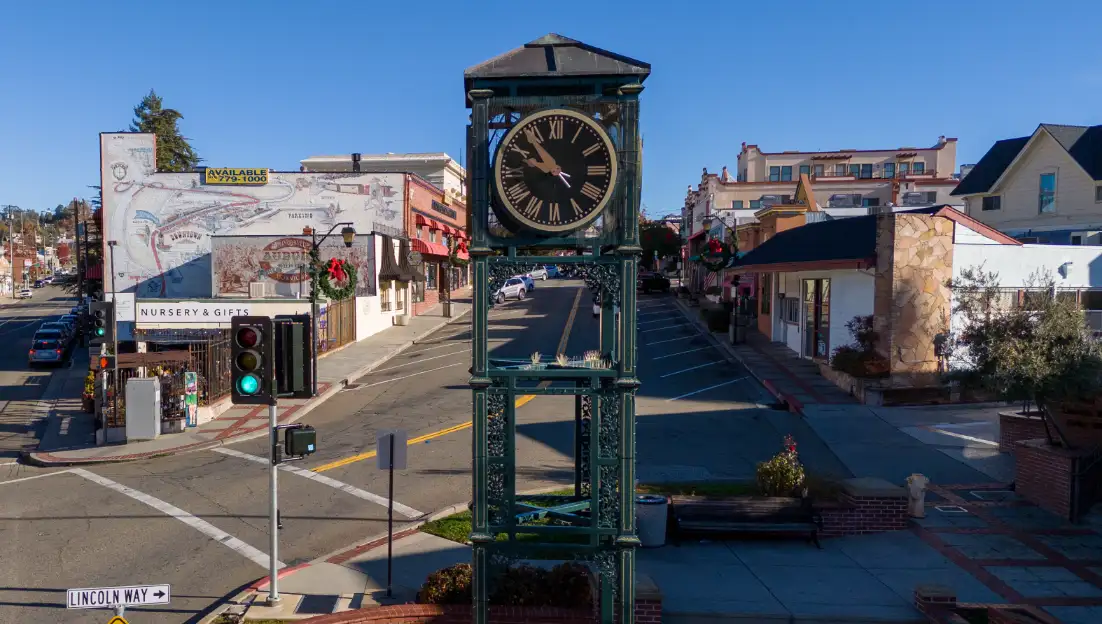 Historic clock tower at a crossroads in the bustling downtown of Auburn, CA.