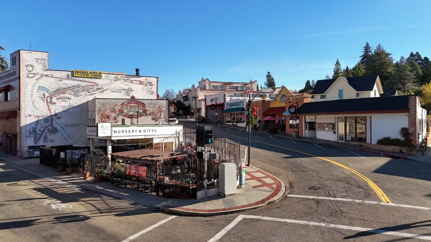 Mural and clock tower at the intersection in the picturesque downtown Auburn, CA.