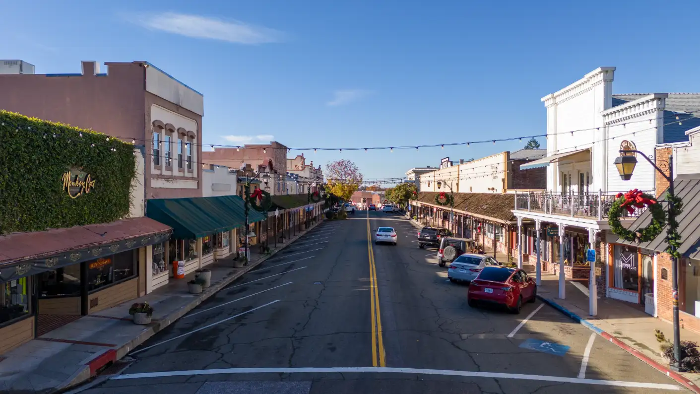 Downtown Auburn, CA street scene with local businesses and historic architecture.