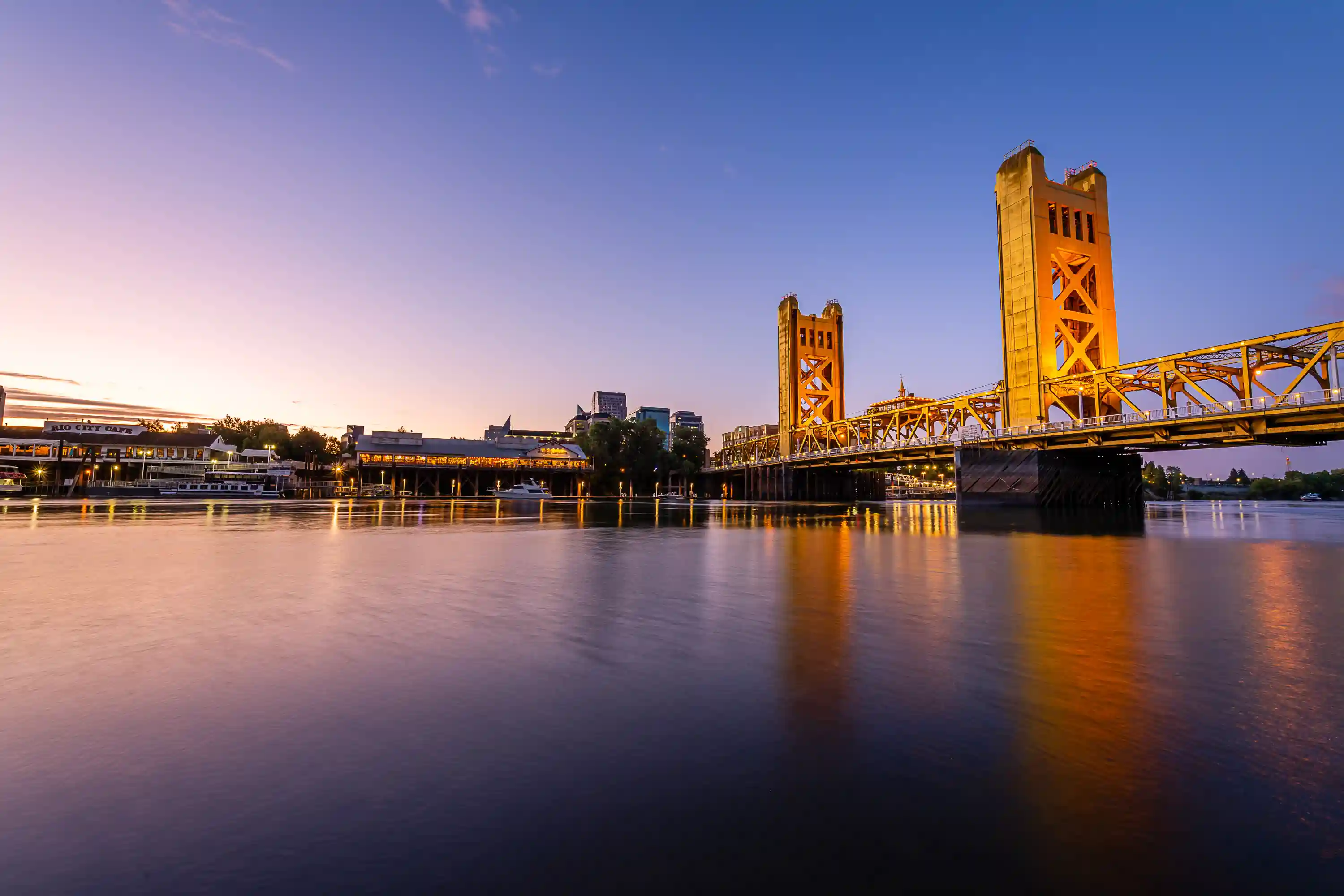 a large bridge spanning over a large body of water near Sacramento