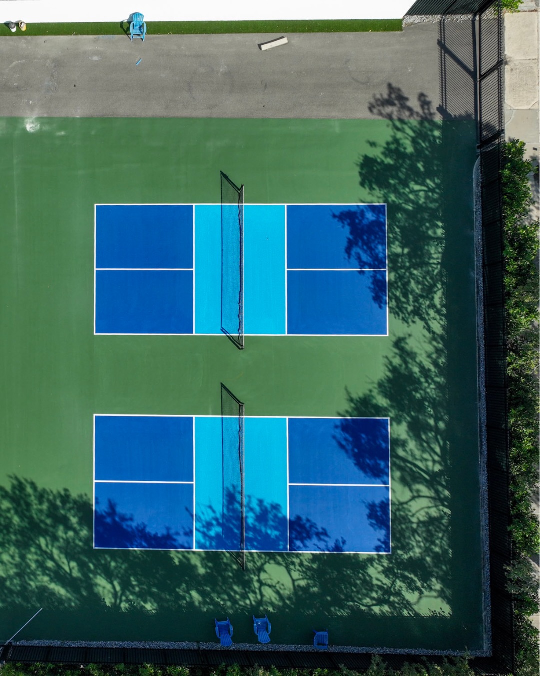 In-ground Addict Pickleball net systems at Patel private club courts in Tampa, FL