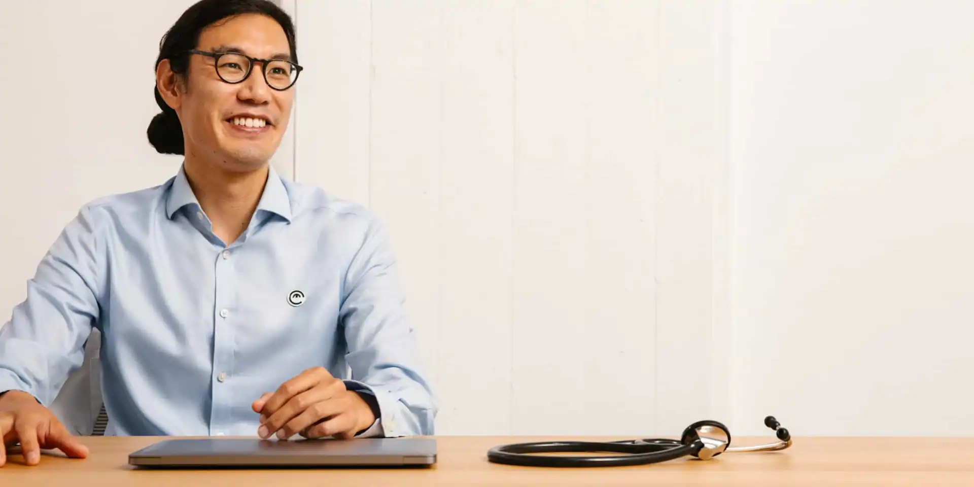 Doctor in front of desk