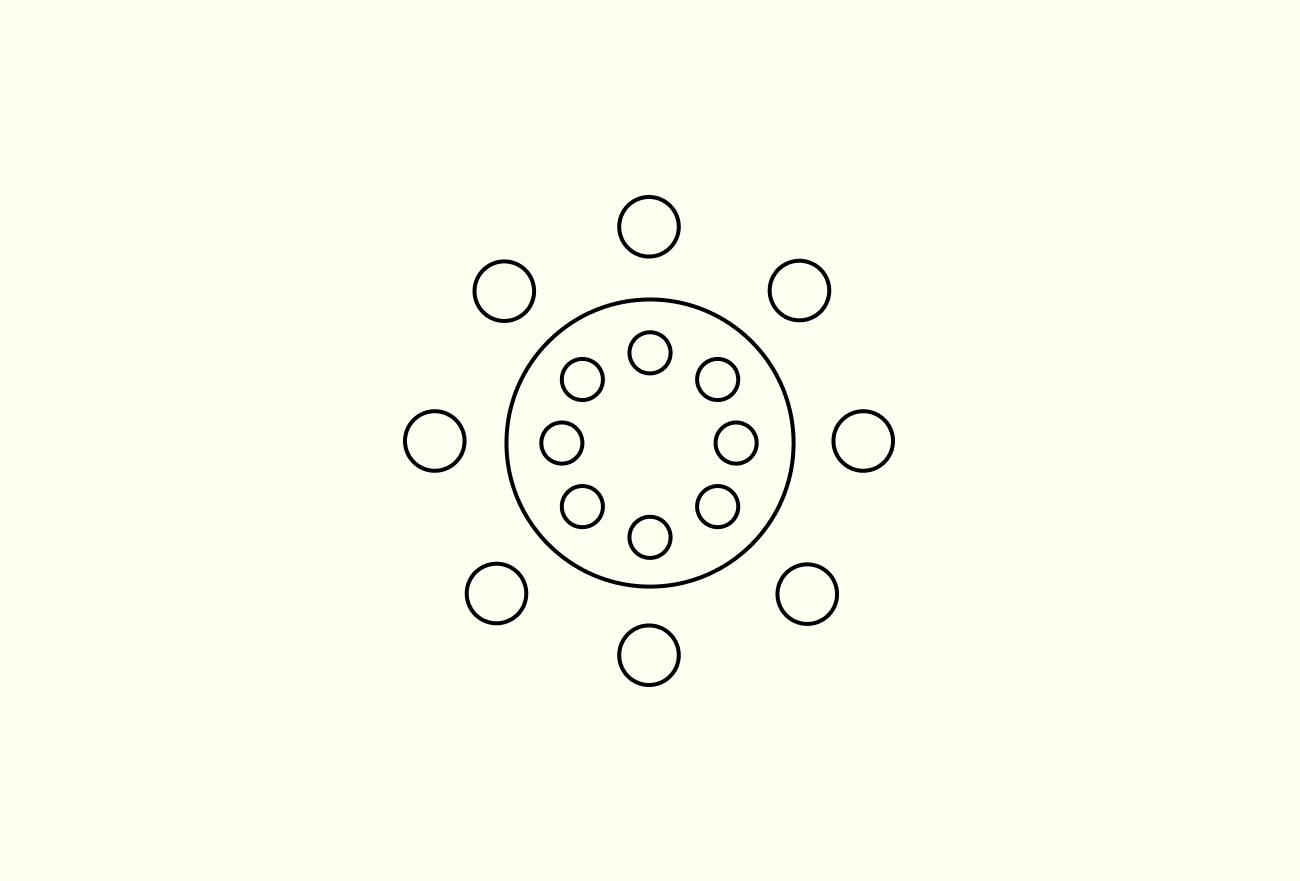 Central circle with inner circles surrounded by outer circles on cream background