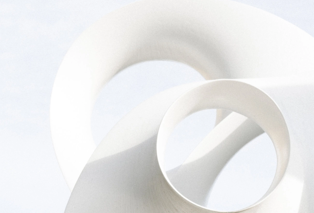 Abstract white nested 3D cylindrical shapes with soft shadows on light background creating spiral