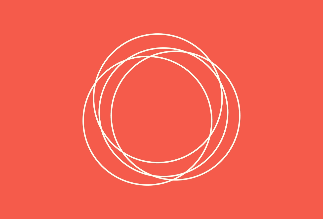 White concentric circles with spiral rotation pattern on coral background