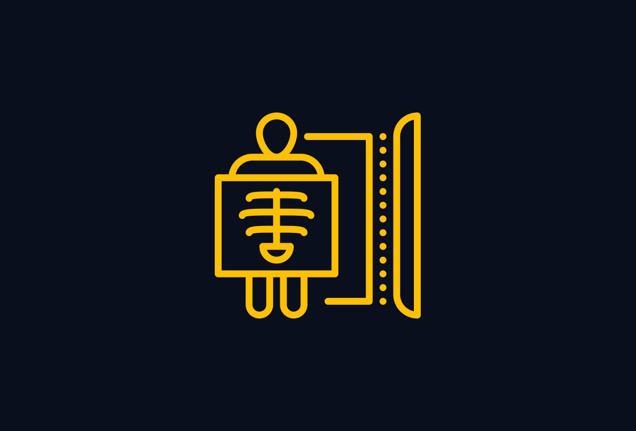 Yellow line icon of person undergoing x-ray imaging with skeleton visible on dark background