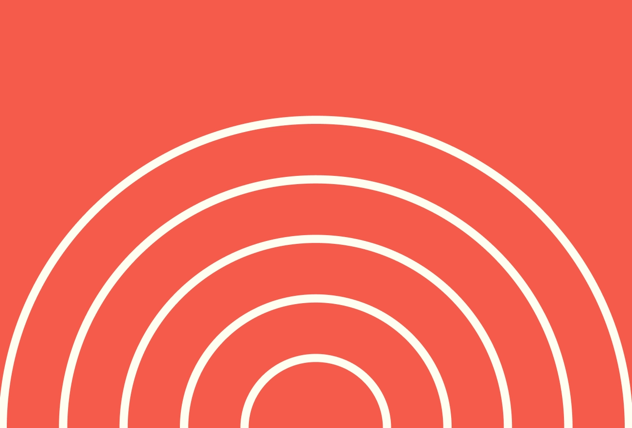 Concentric white arcs in semi-circular pattern on coral background