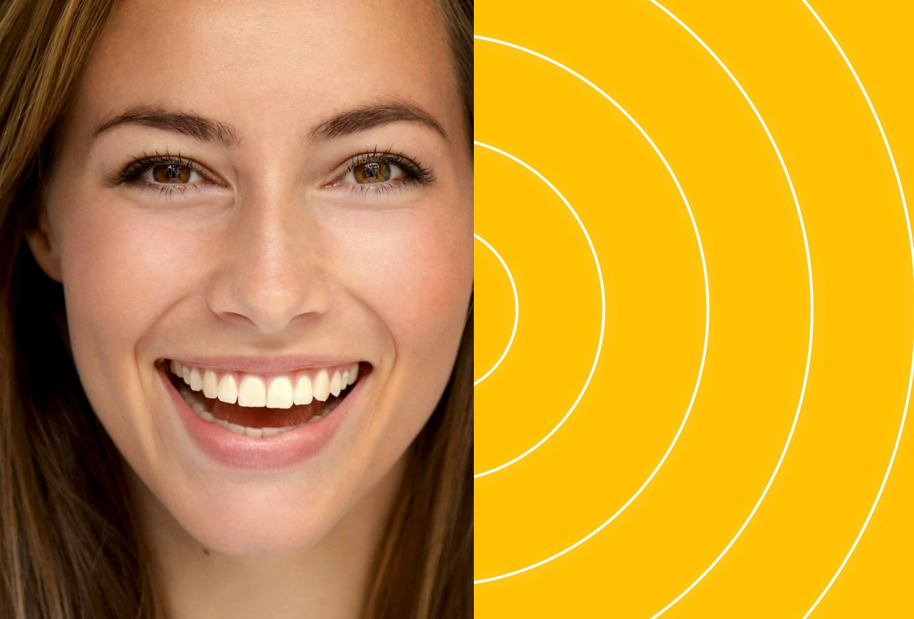 Woman laughing on left side next to yellow background with white curved lines