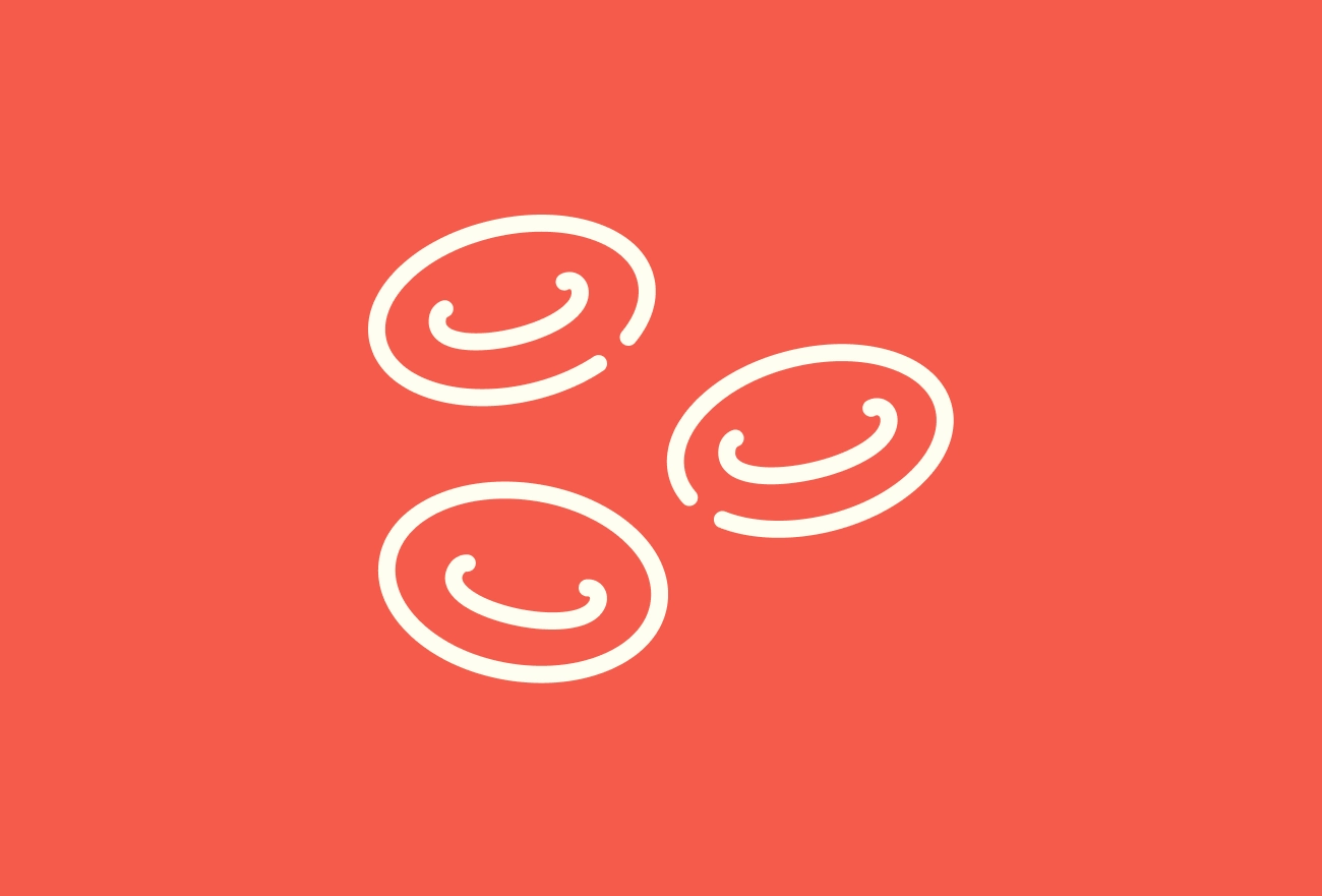 Three white bacteria or microorganism icons on red background