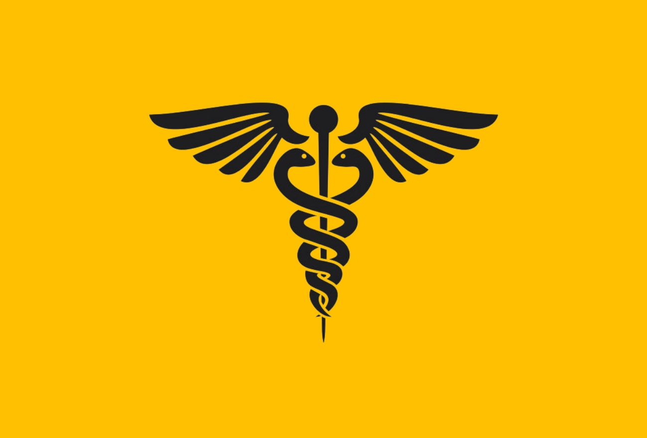 Black caduceus medical symbol with wings and intertwined snakes on bright yellow background