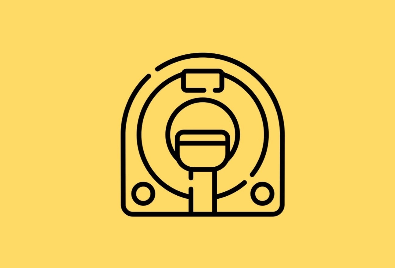Black line icon of an MRI machine on yellow background