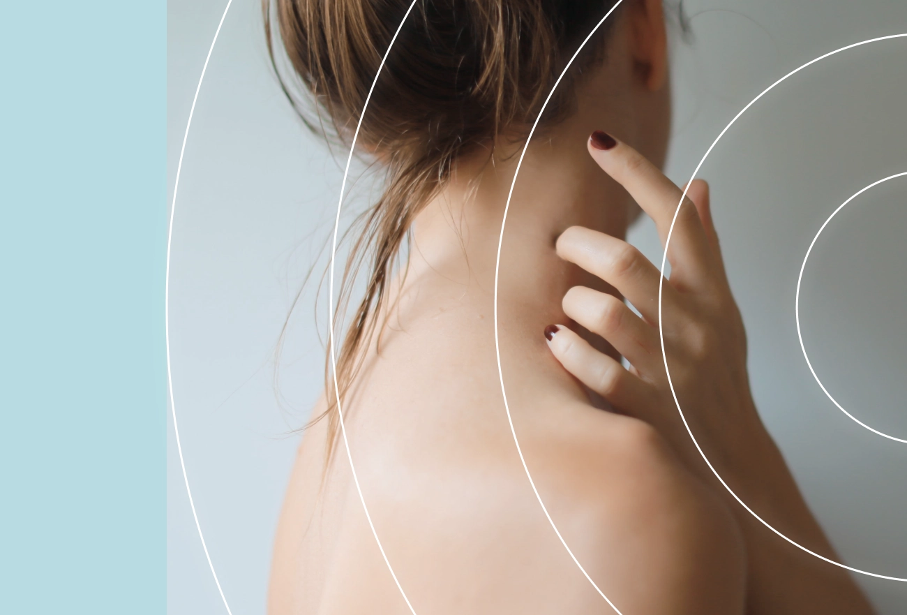 Woman touching back with white curved healing lines overlay on split blue and gray background