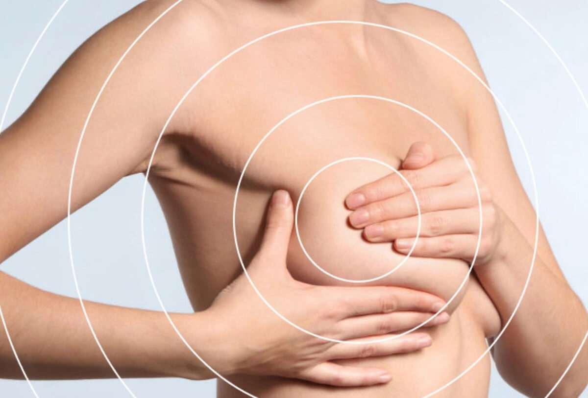Woman performing breast self-examination with circular pattern overlay showing examination technique