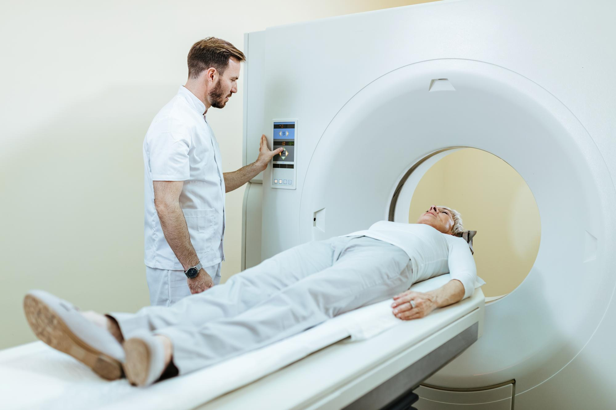 Detecting cancer in a cyst using CT scans.