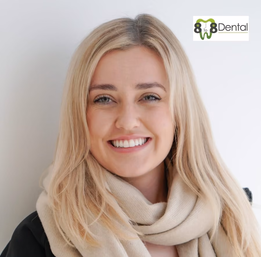 Smiling young woman with blonde hair wearing a beige scarf and black top, with 8 to 8 Dental logo in the background.