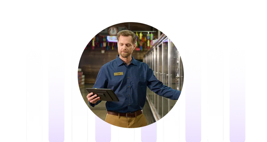 manager in a grocery store looking at real time inventory information with a sample bar graph in the background